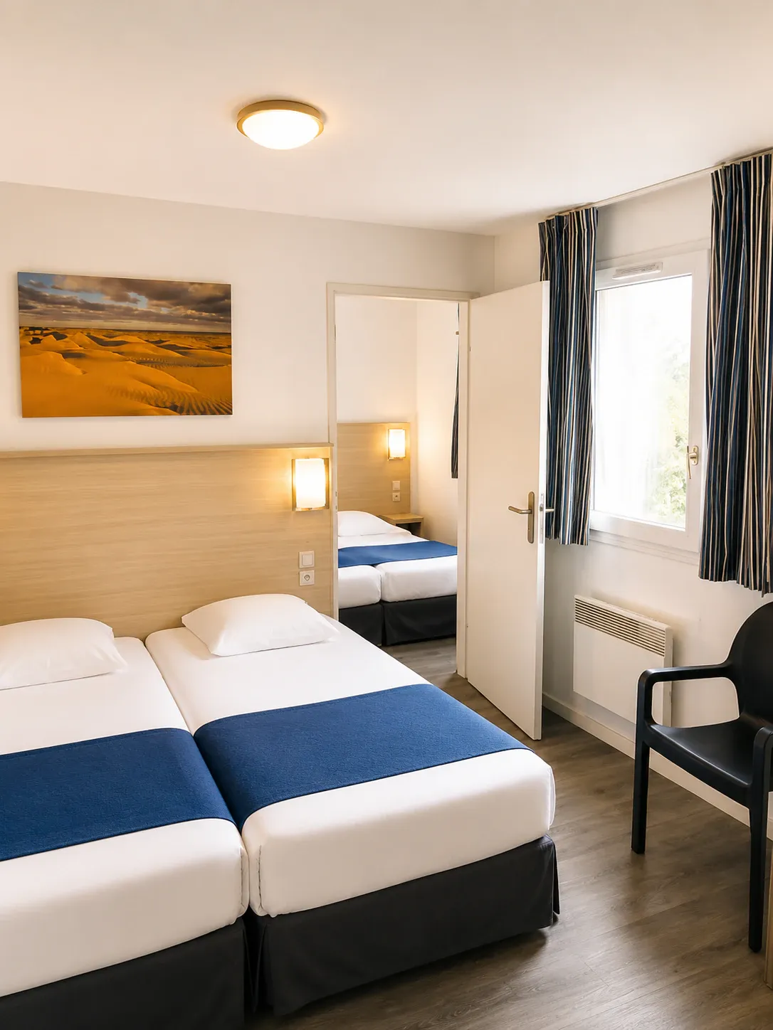 Appartement Familial — lits jumeaux du séjour